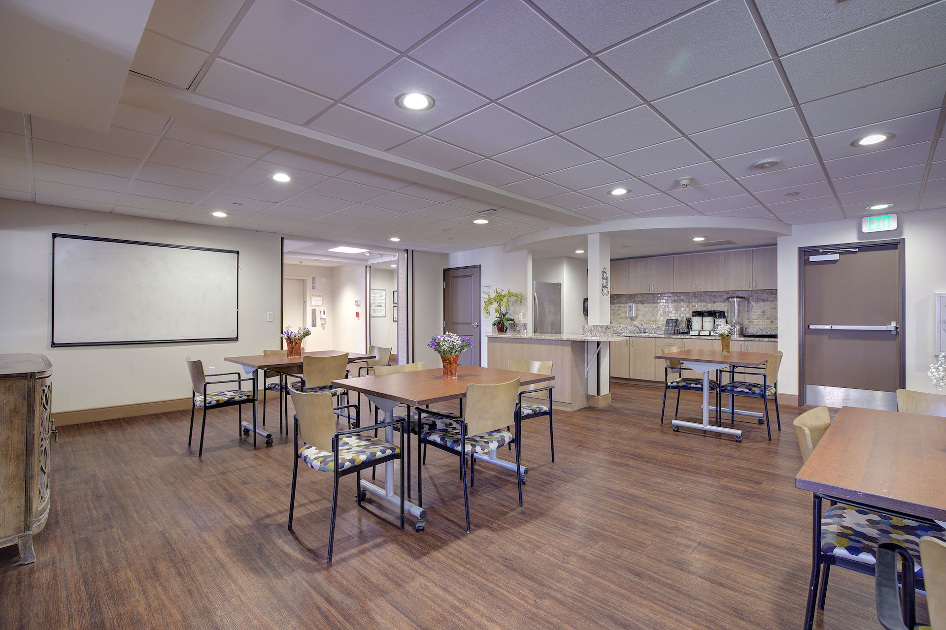 room filled with tables and chairs